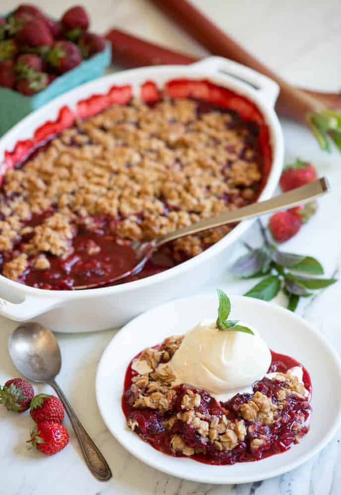 Strawberry Rhubarb Crisp in a white dish.