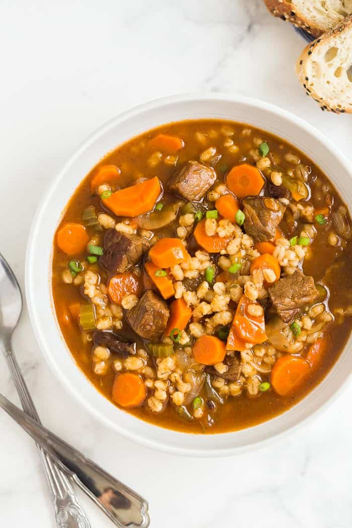 beef barley soup in bowl overhead