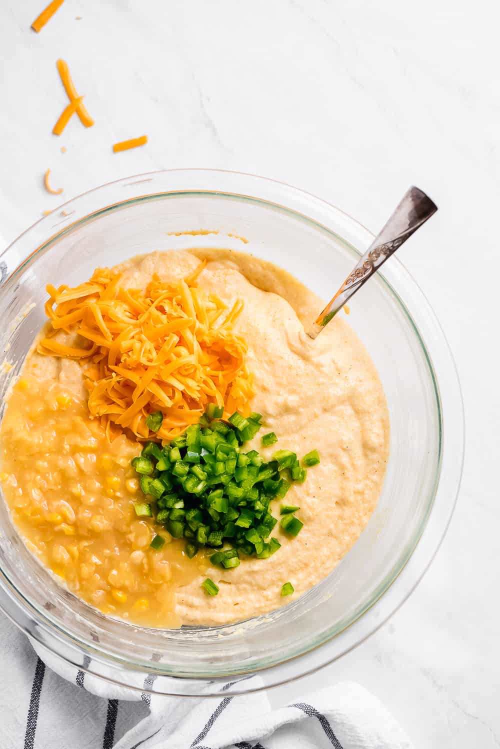 jalapeno cornbread mixed together in a bowl.