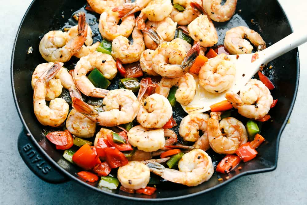 shrimp and bell peppers sautéing together