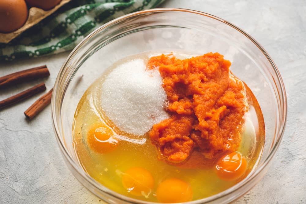 pumpkin cake ingredients in a bowl