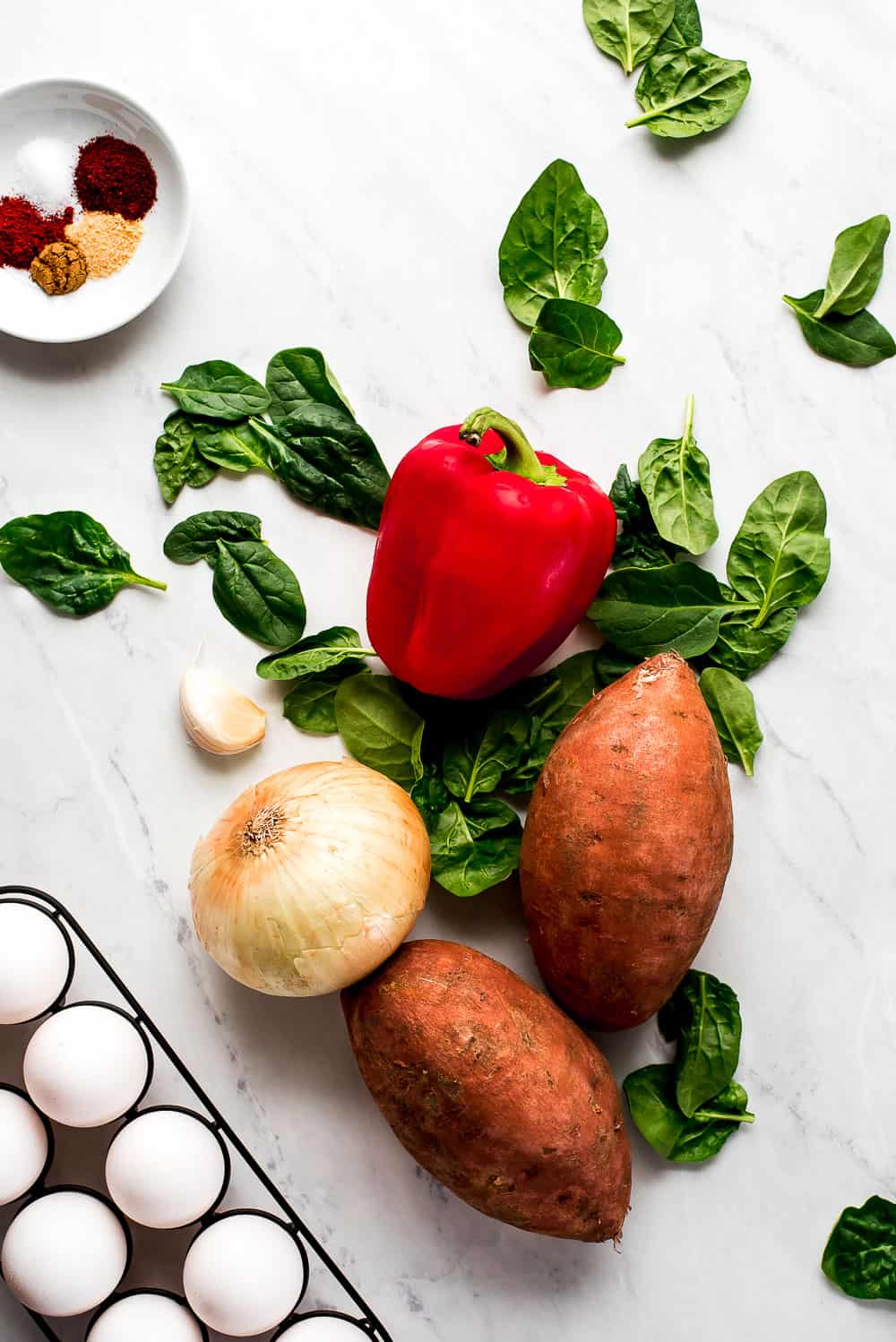 fresh vegetables and sweet potatoes in a picture 