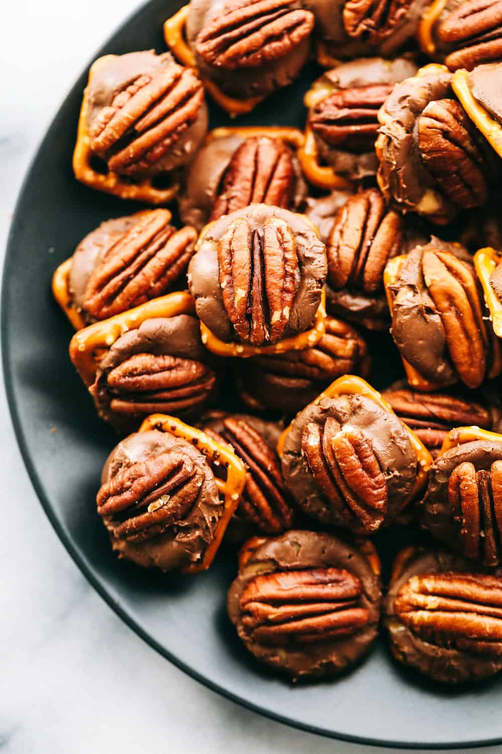 rolo pretzel turtles on a plate