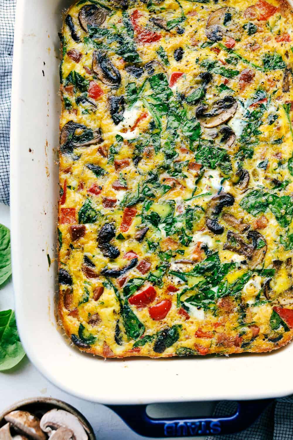 Sausage mushroom breakfast bake baked in a casserole pan.