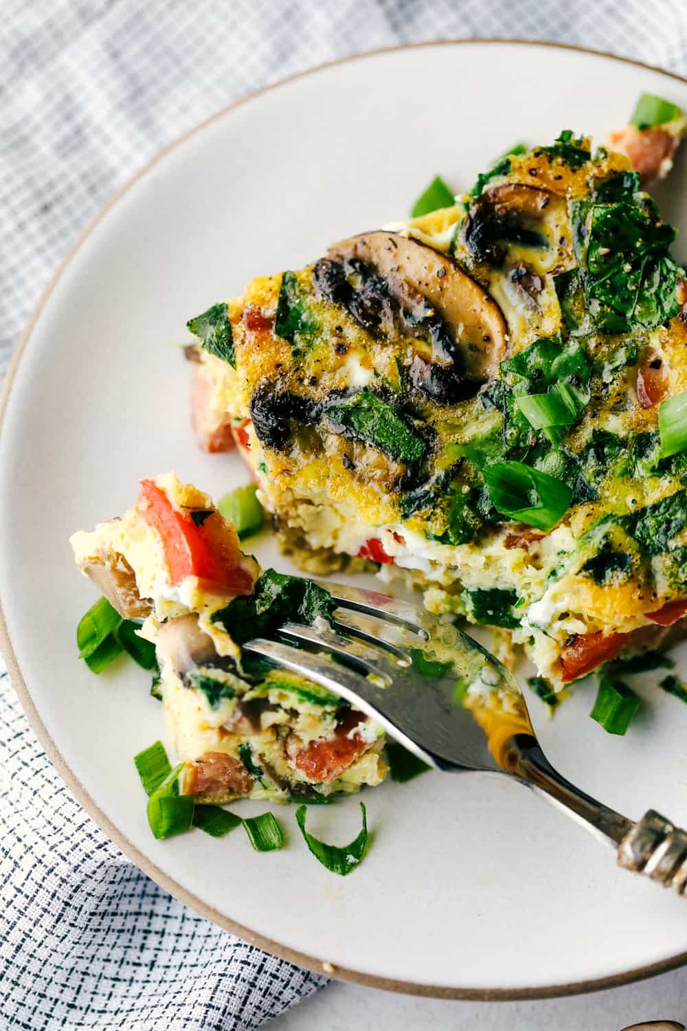 Sausage mushroom breakfast bake served on a plate. 