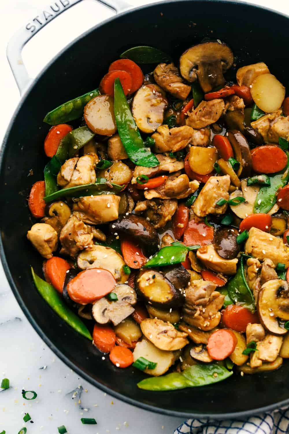 Moo goo gai pan in a staub pan. 