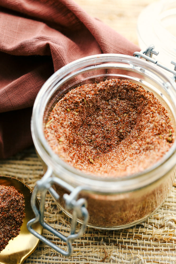 Fajita seasoning in a jar mixed together. 