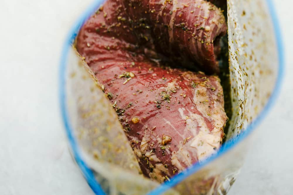 Ziplock bag with flank steak and marinate. 