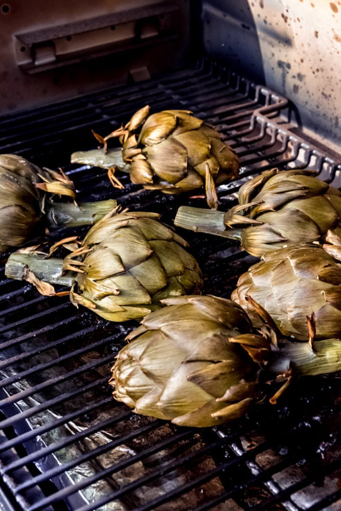 Artichokes on a grill.