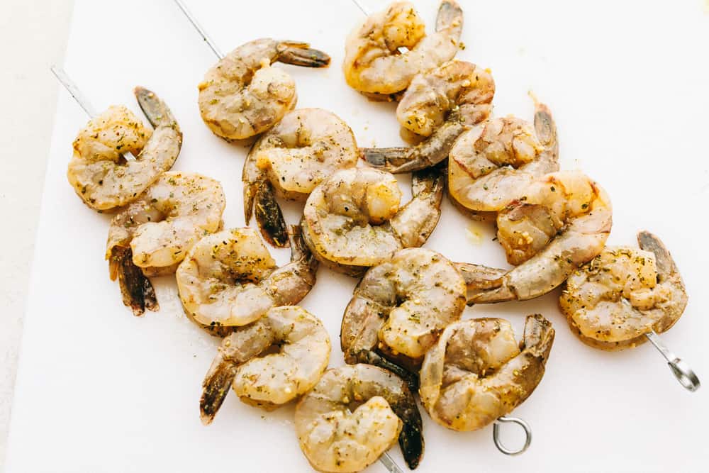 Grilled shrimp ready to grill on a skewer.