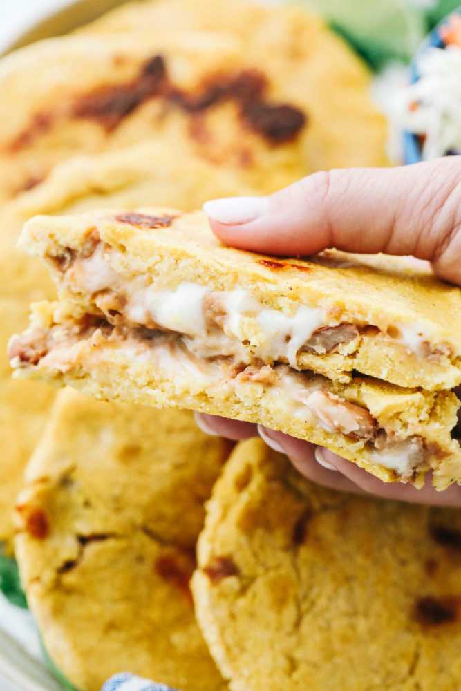 Close up on the inside of bean and cheese pupusas