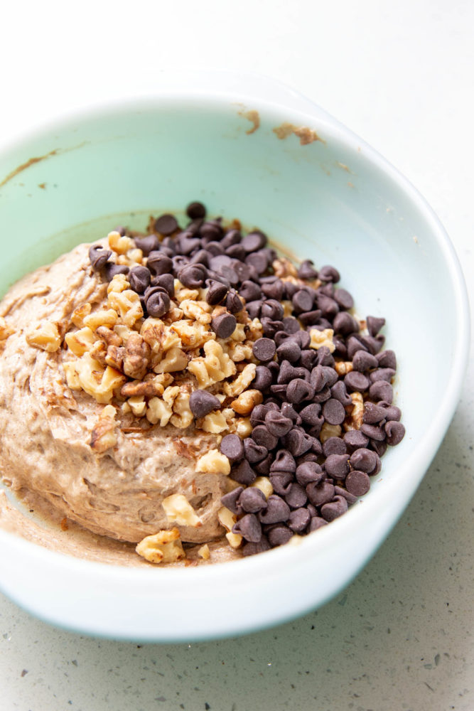 Mixing banana cookie dough in a mixing bowl