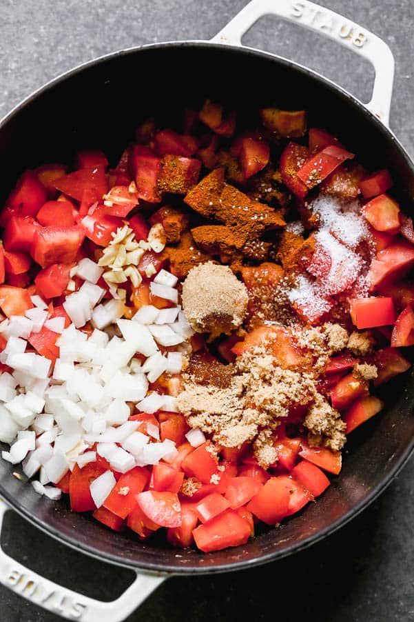 Overhead photo of the ingredients in the tomato jam. 