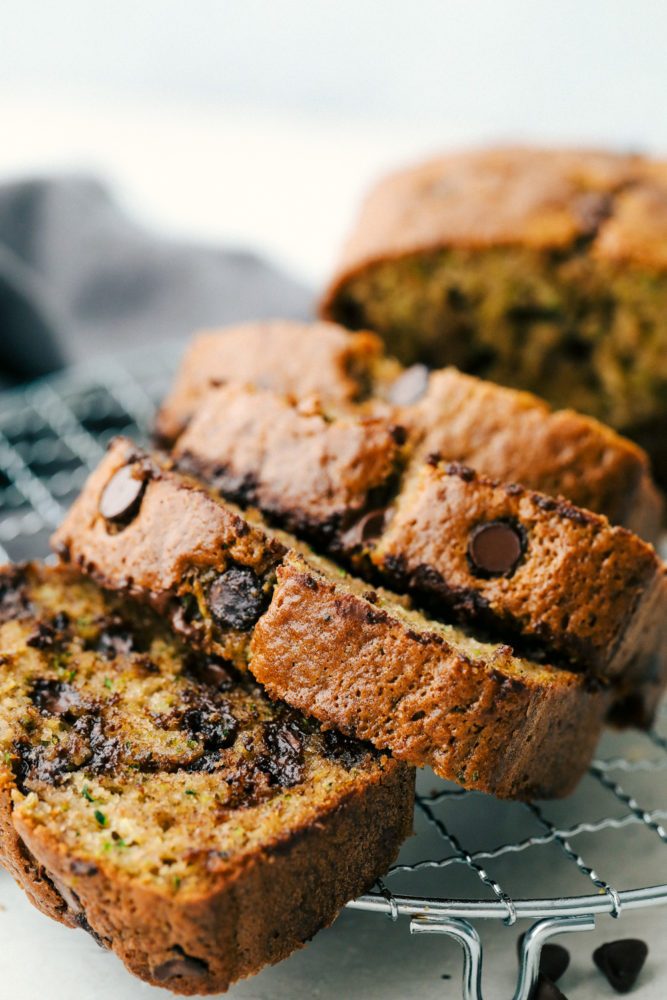 Sliced Zucchini Bread on a cooling rack.