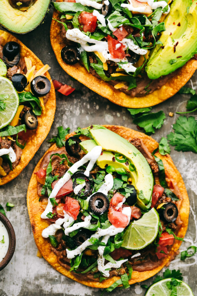 Three tostadas layered with optional toppings. 