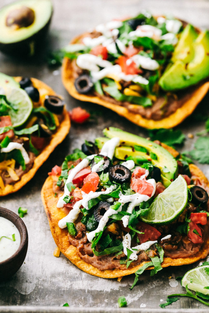 Tostadas with layers of optional toppings. 