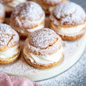 Cream puffs on a serving plate