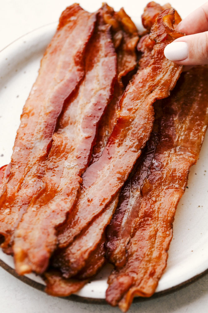 Crispy baked bacon on a plate. 