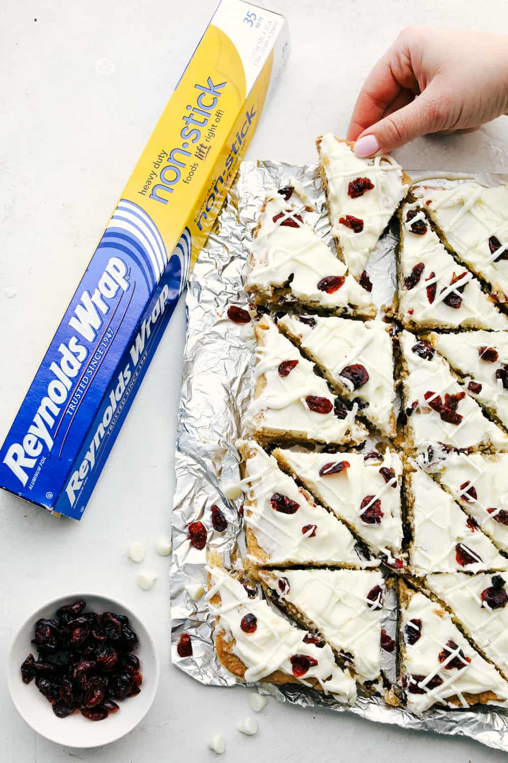 Cranberry bliss bars cut into triangles. 