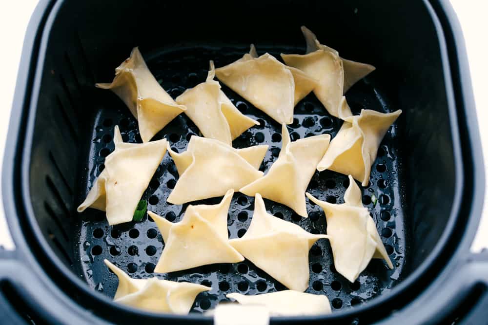 Wontons in the air fryer ready to cook. 