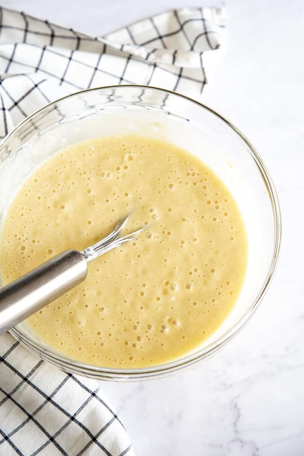 Whisking up the boston cream cake batter.