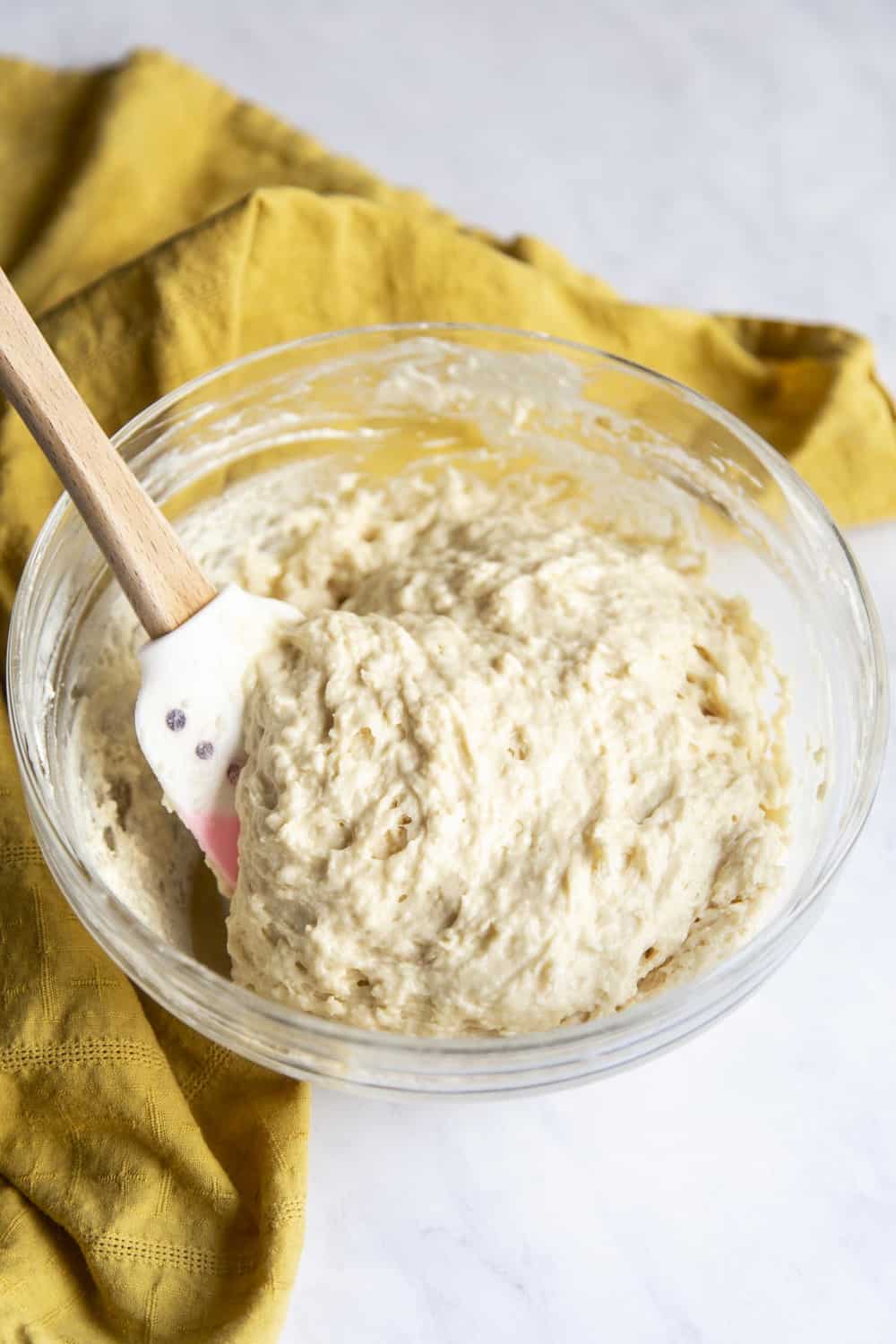 The donut batter in a bowl. 