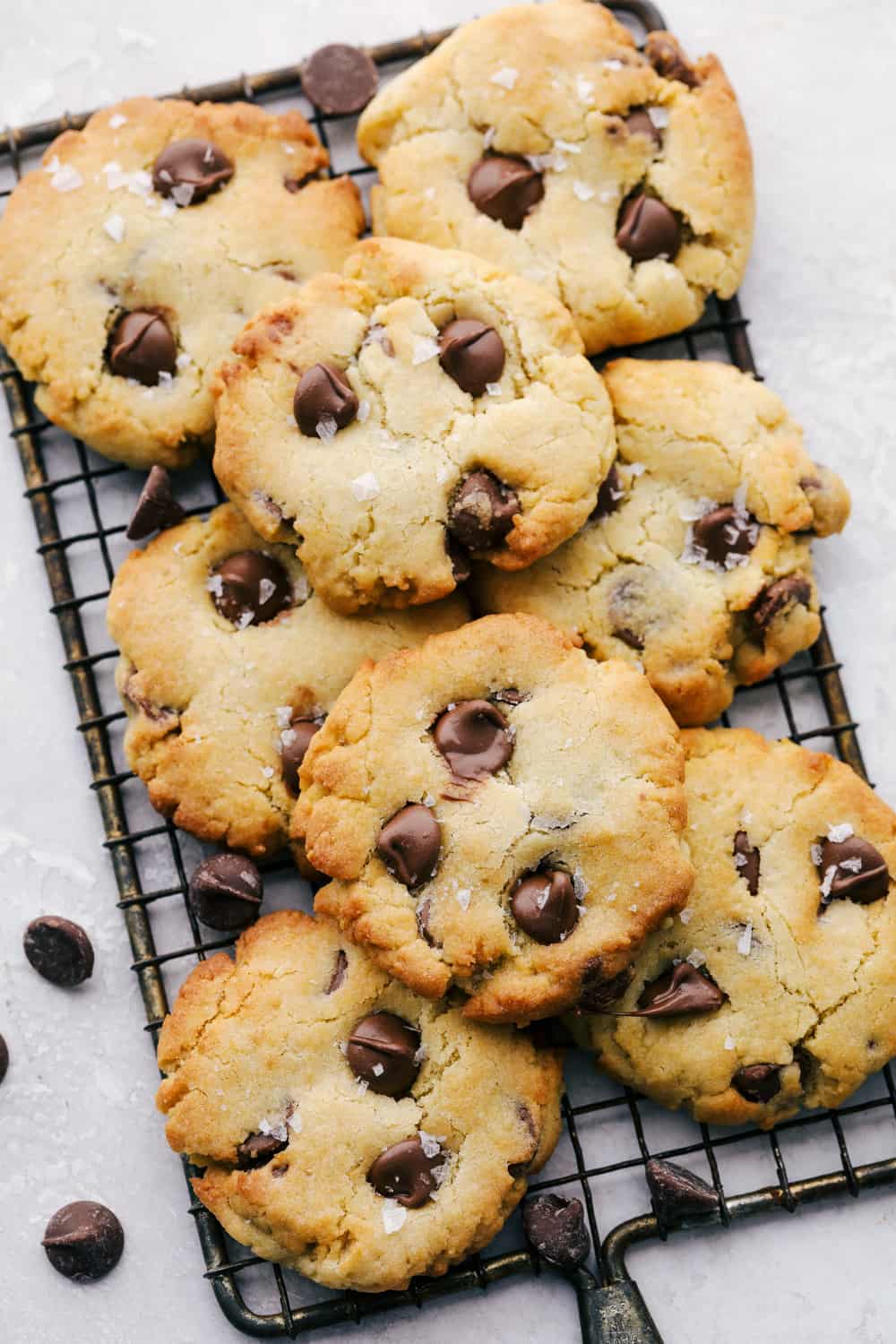 Stacked cookies on a cooling rack. 