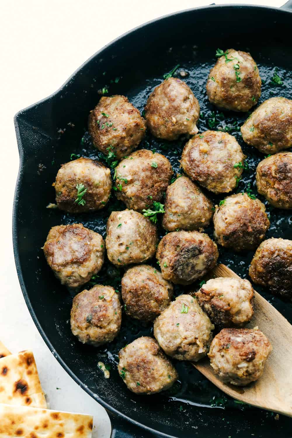 Meatballs in the skillet browned and ready to serve. 