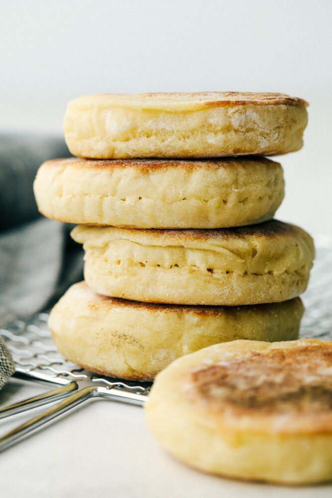 Stacked English muffins with the poke holes for easy cutting. 