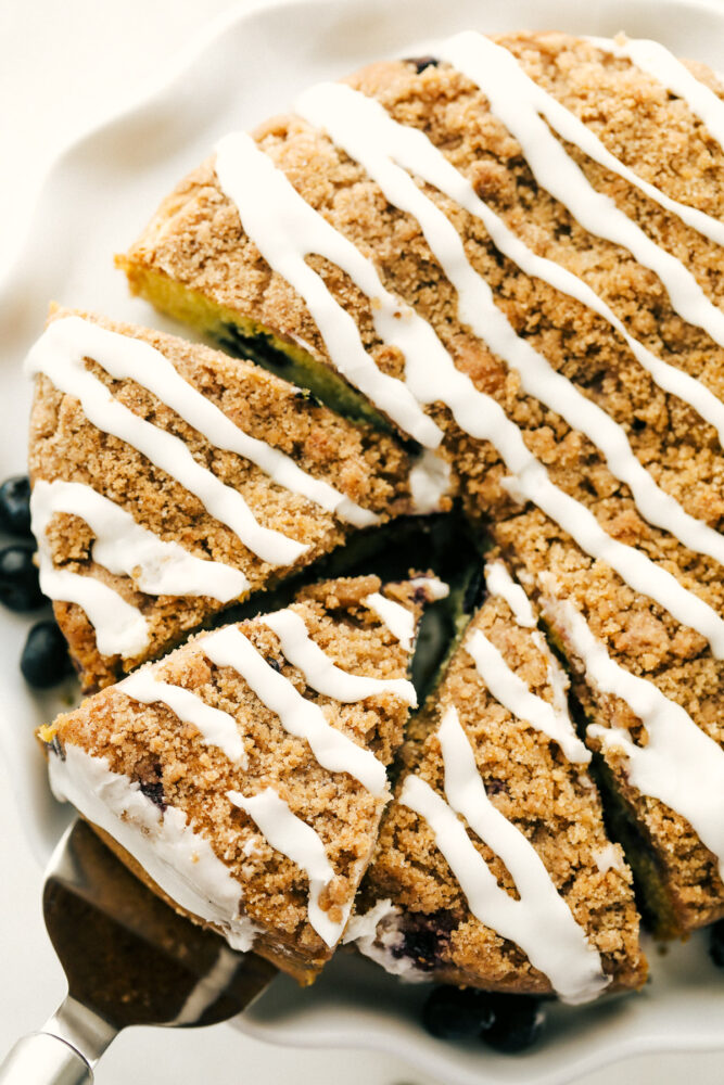 Slices of baked blueberry crumb cake. 