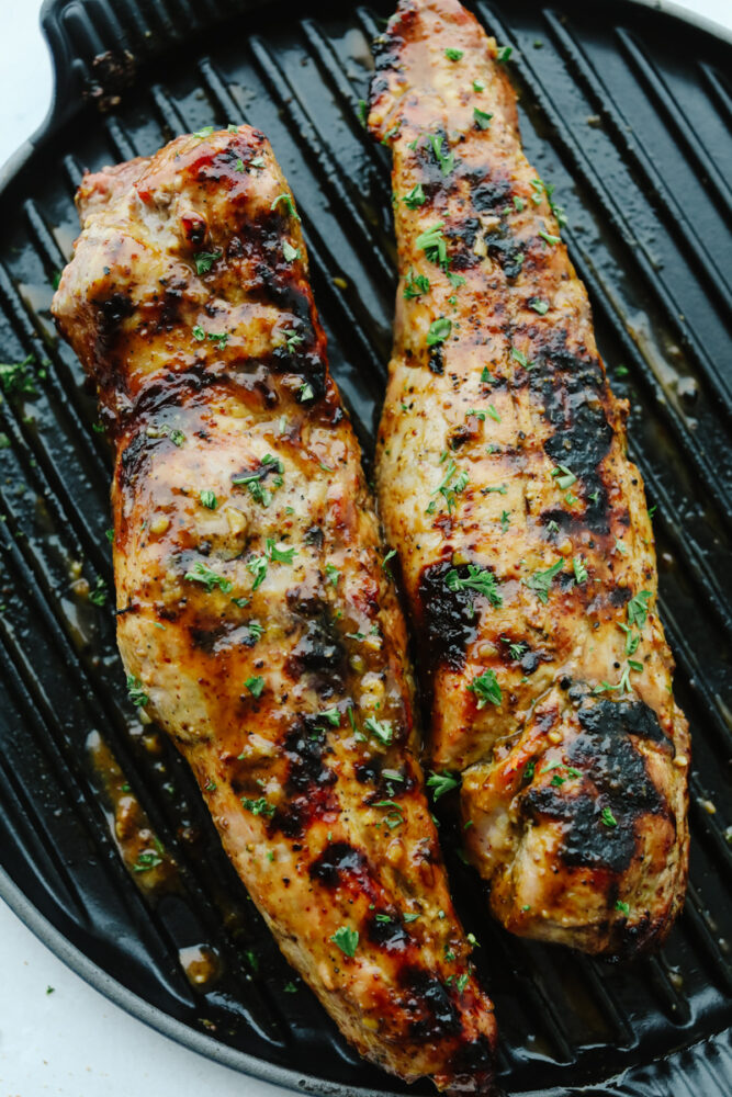 Honey Dijon Garlic Pork Tenderloin on grill. 