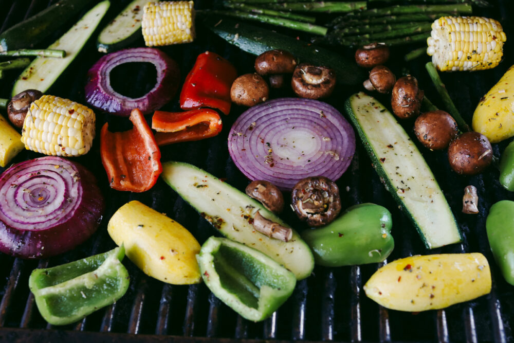 Marinated vegetables on grill.