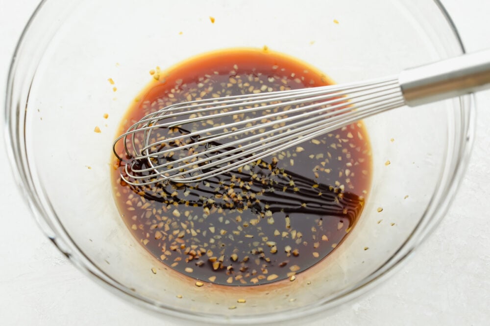 Whisking together marinade.