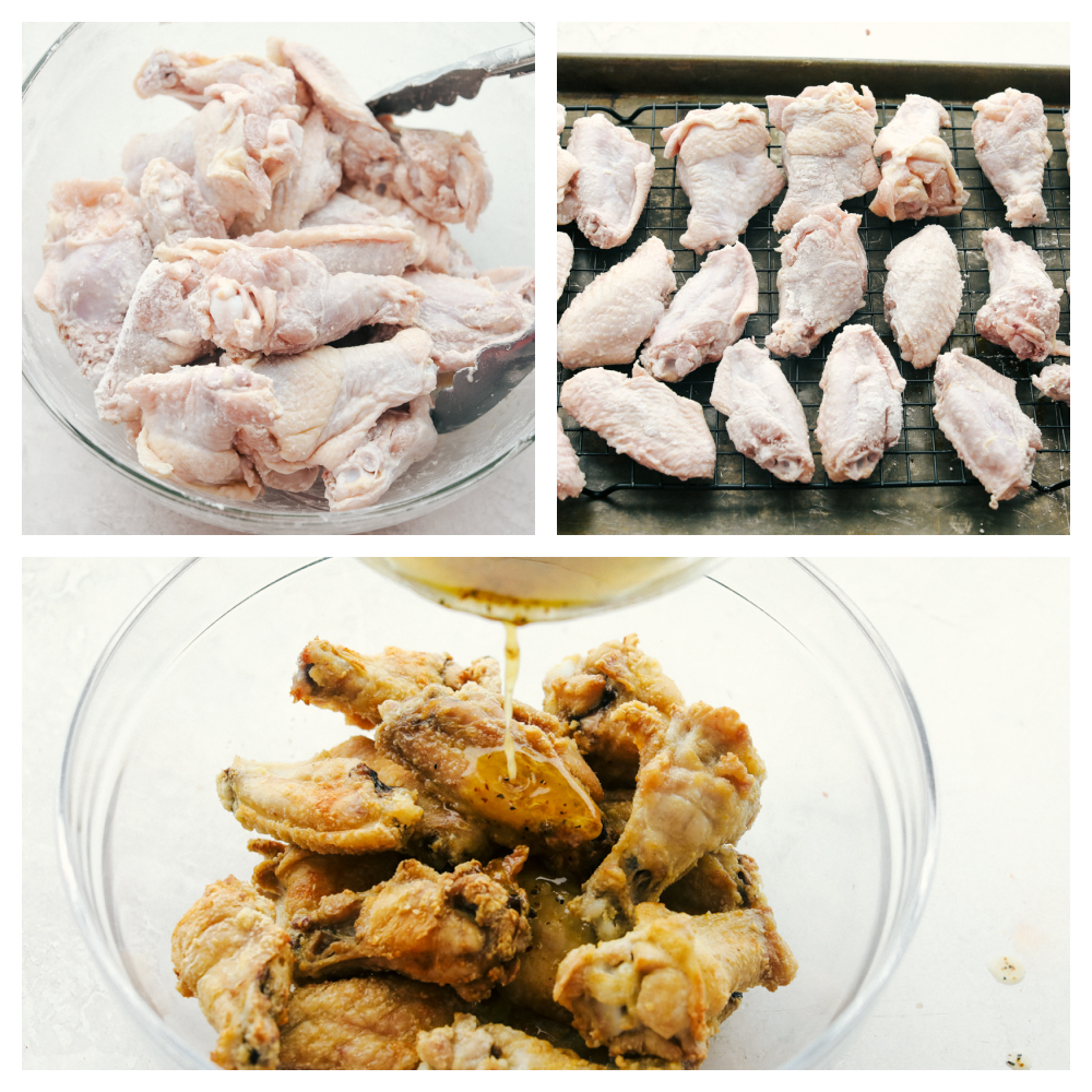 Chicken wings in a glass bowl being tossed in sauce. 