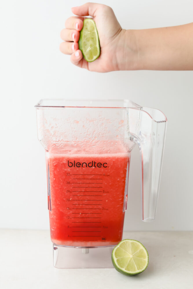 Adding lime to watermelon agua fresca