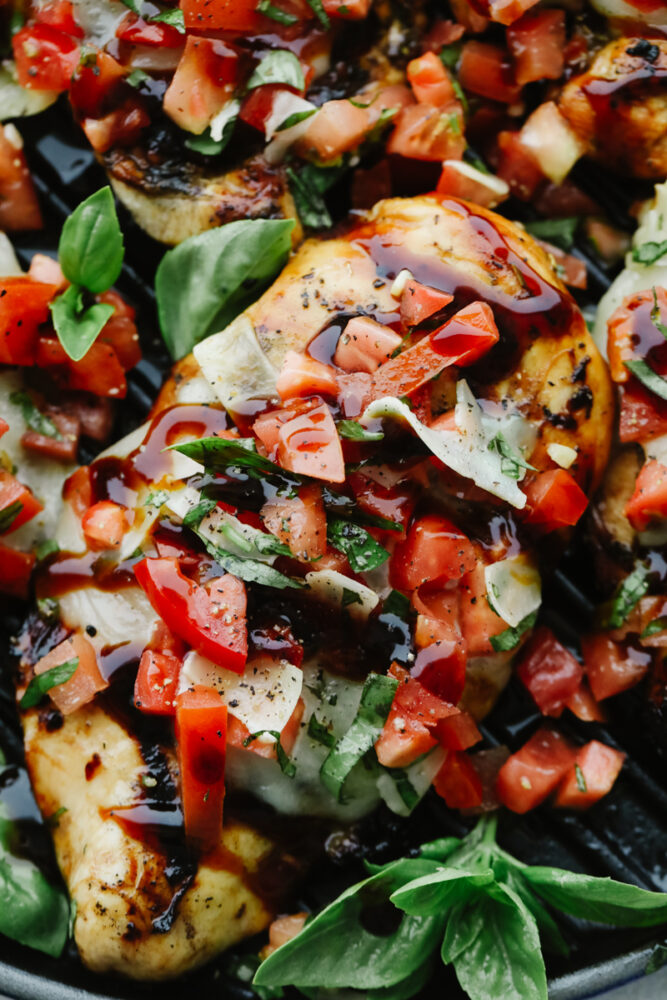 Close-up of Bruschetta Chicken and toppings.