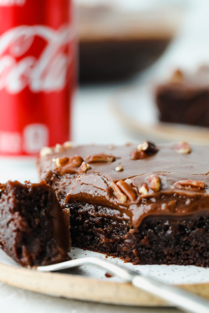 Taking a bite of Coca-Cola cake.