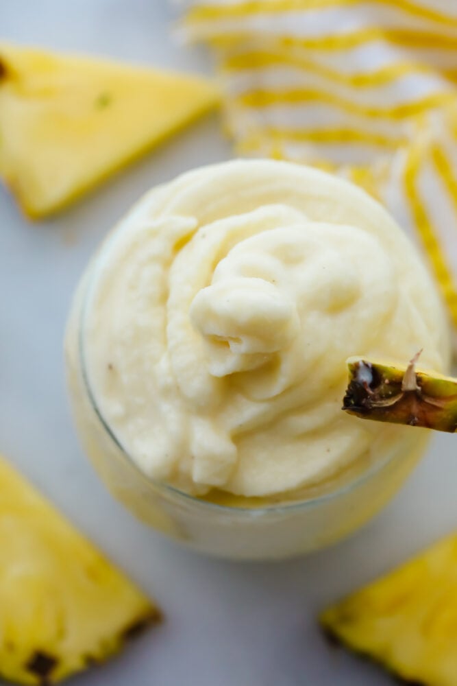 Creamy texture of a pineapple whip up close. 