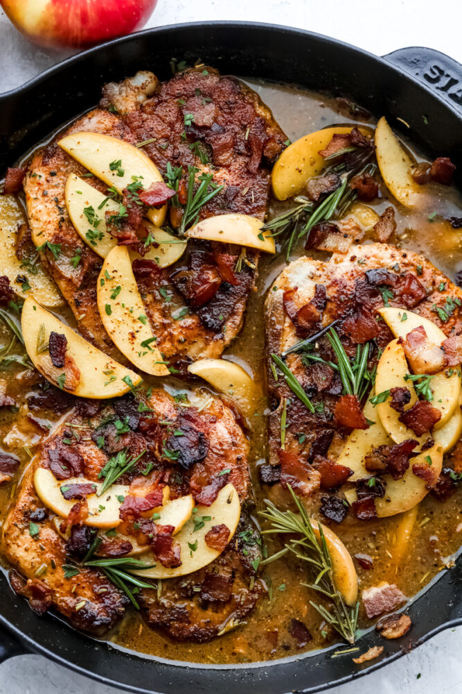 Pork chops with  apples and bacon in a spicy sauce. 