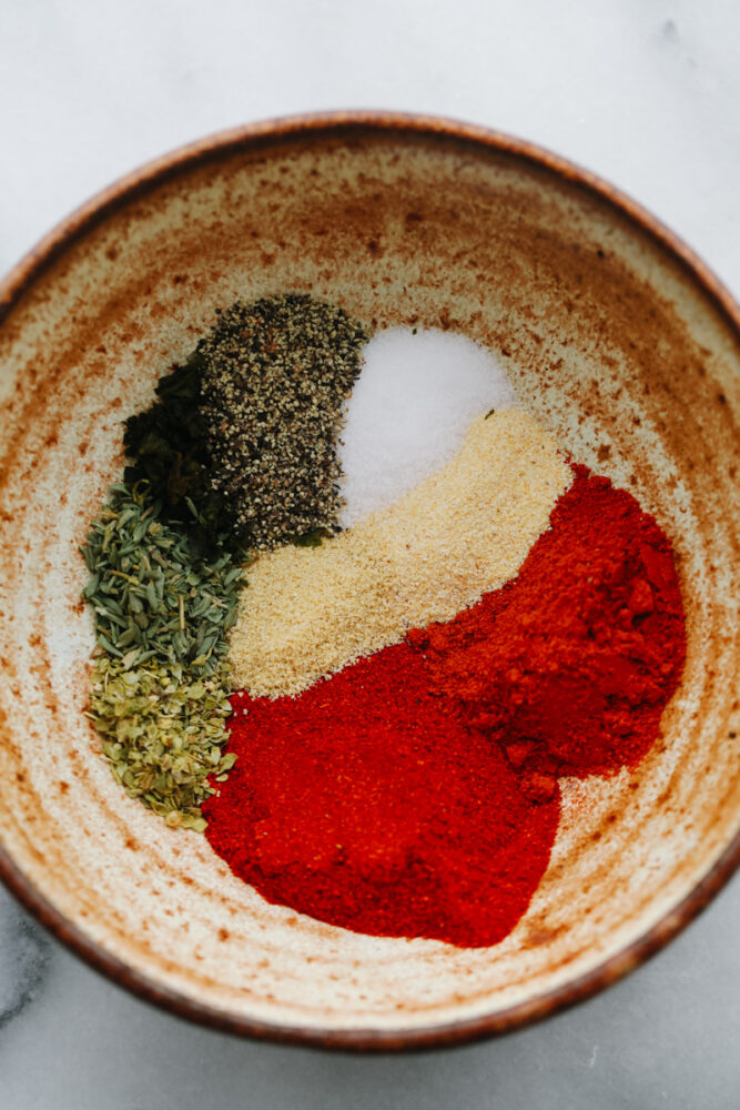 Spices ready to be mixed in a bowl. 