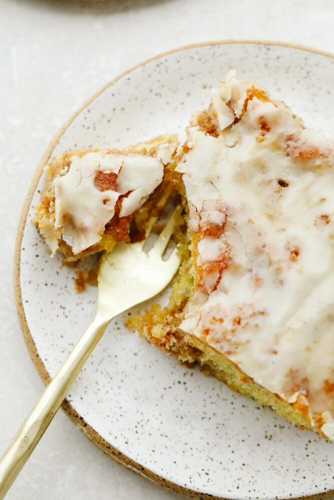 Honeybun cake being cute with a fork. 