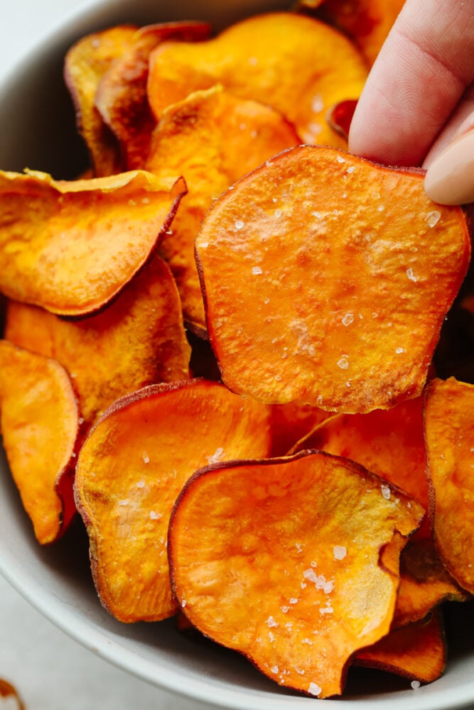 A close up of sweet potato chips. 