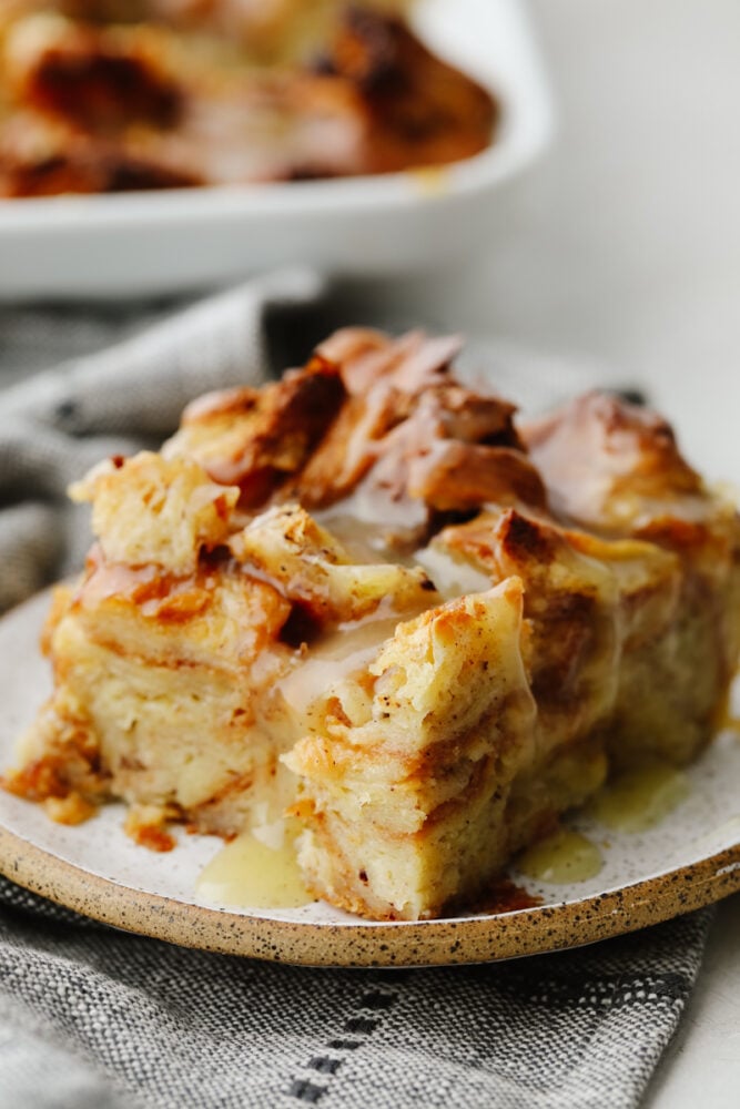 A slice of croissant bread pudding. 