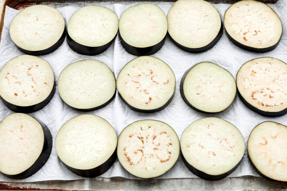 Eggplant on a baking sheet, sweating it out. 