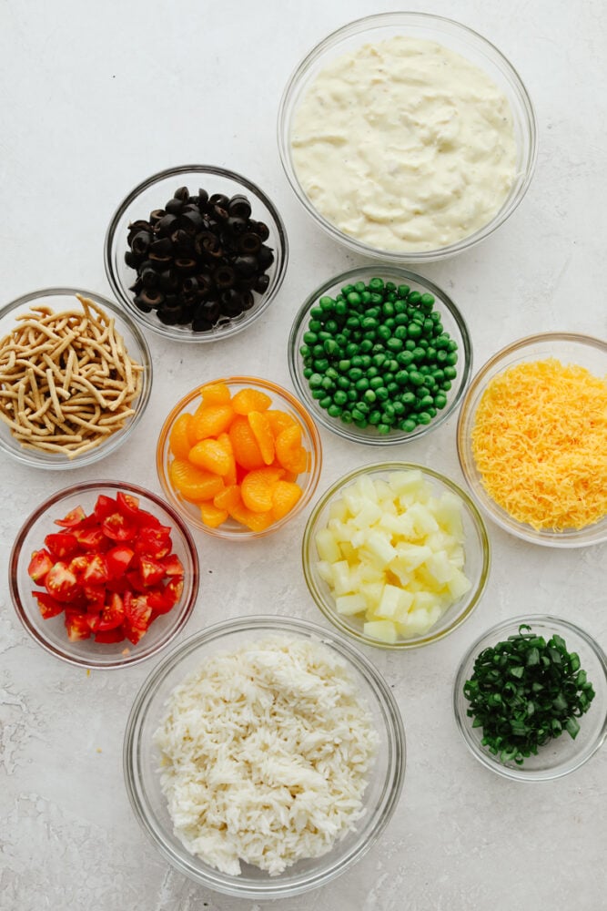 Bowls of haystack toppings, rice, and gravy.