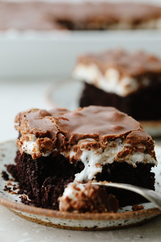 Mississippi mud cake being cut into with a fork. 