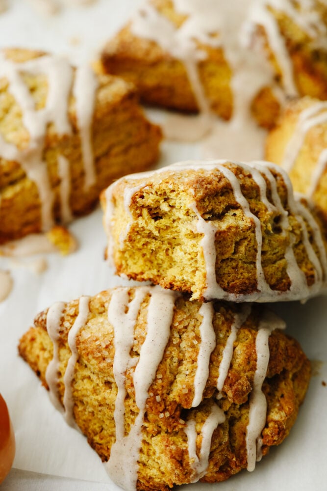 A scone with a bite taken out of it. 