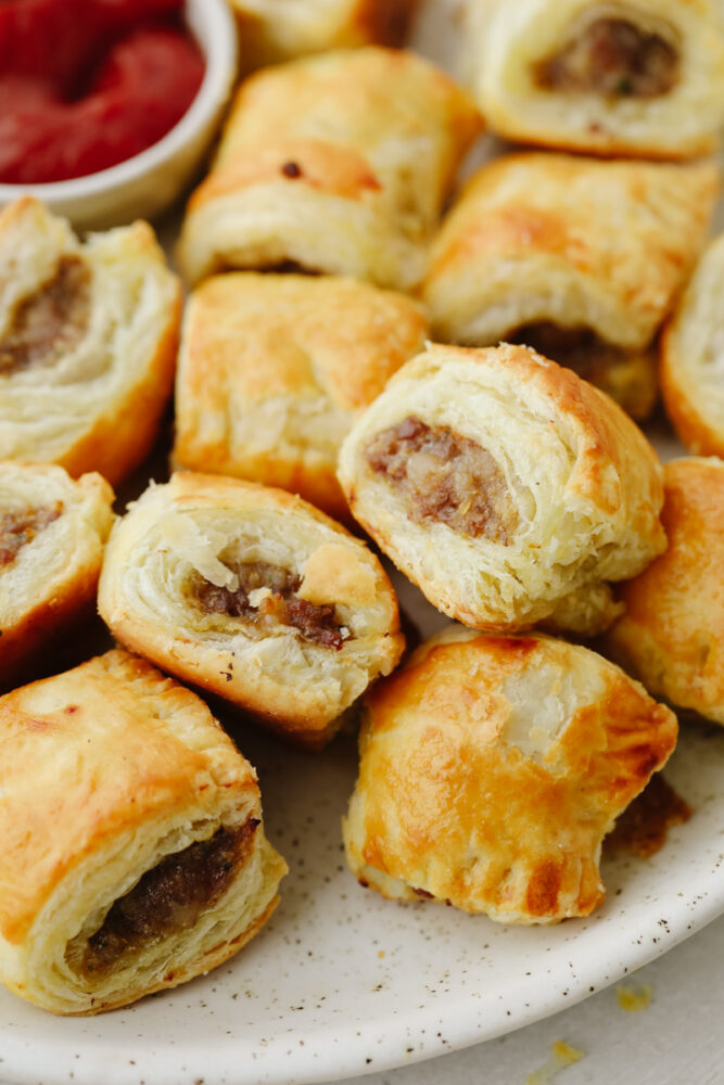 Zoomed in picture of sausage rolls. 