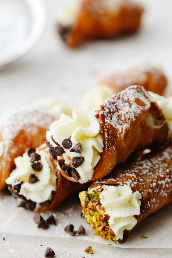 Closeup of 3 cannolis.