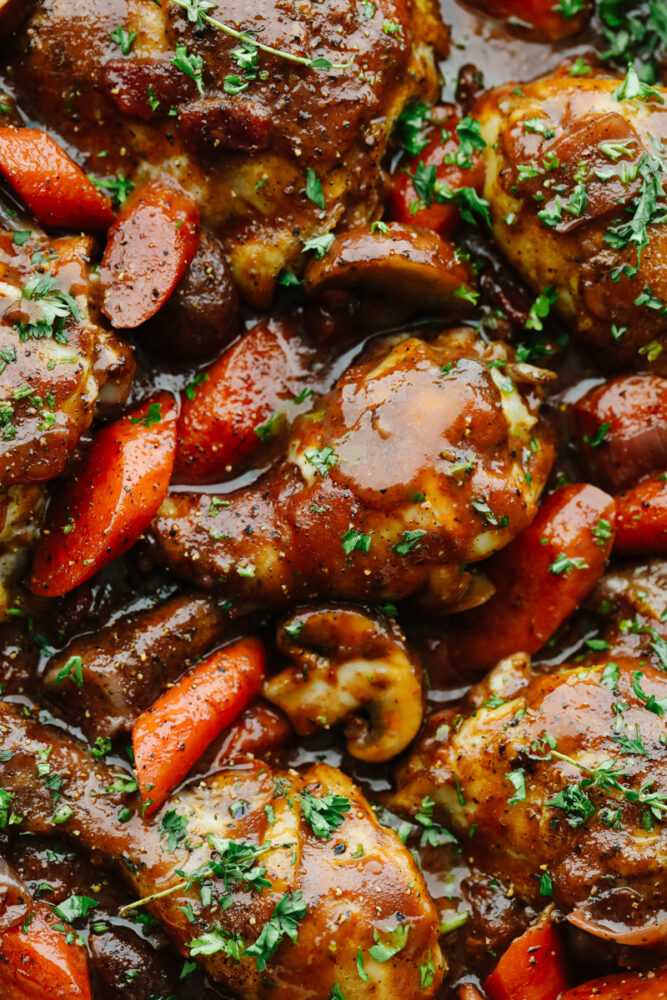 A close up picture of coq au vin. 